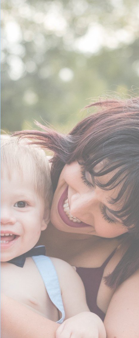 Mother laughing with her baby